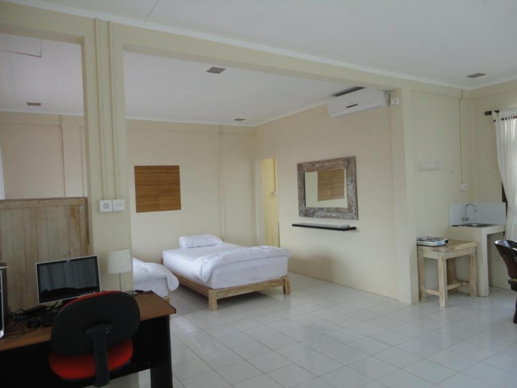 Urbanview Hotel Wayan Mansion デンパサール 部屋 写真